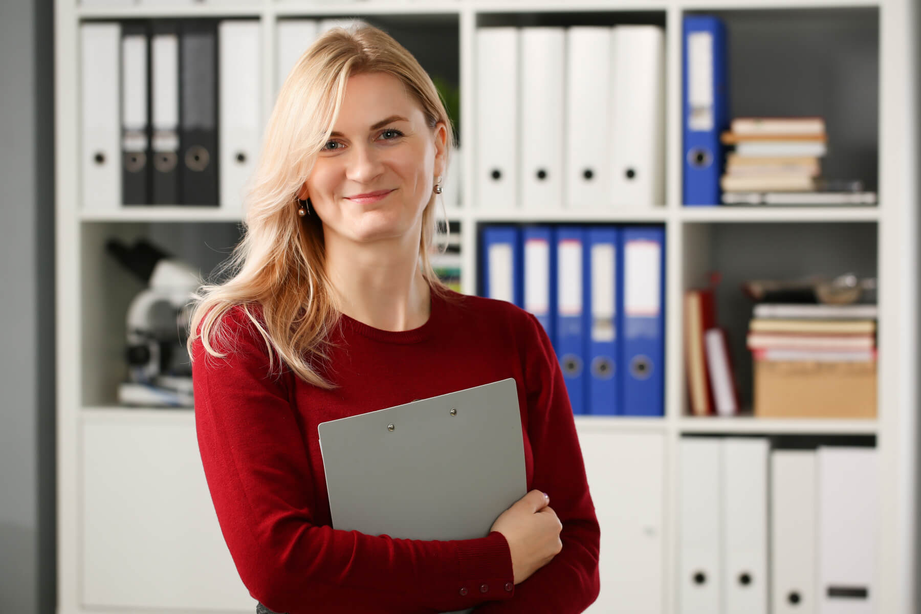 Happy smiling blond businesswoman